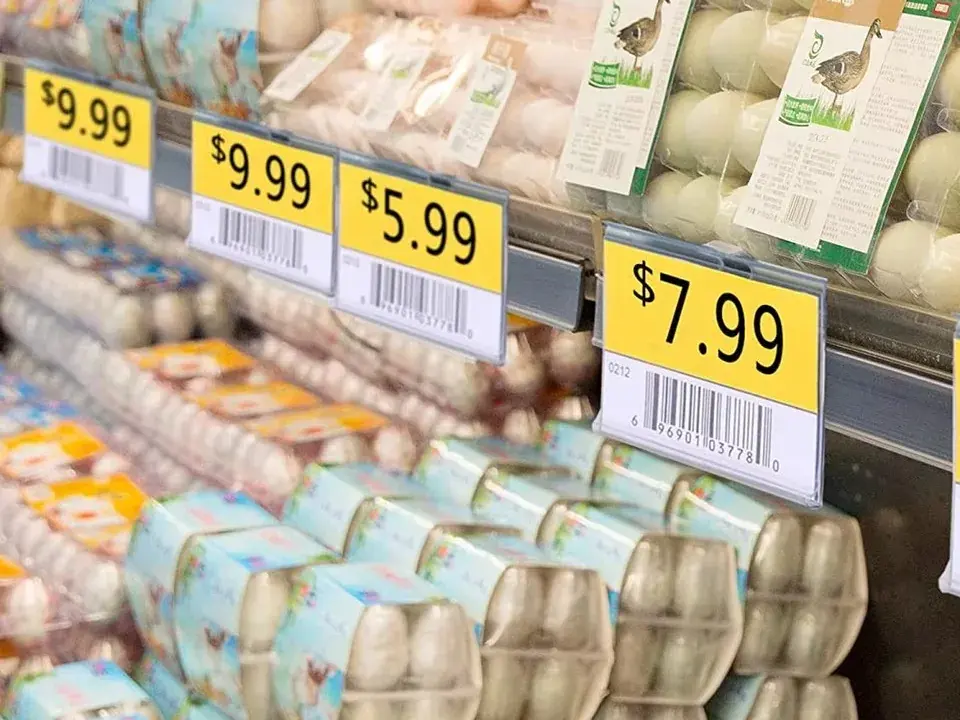 Supermarket shelf label before the edit. The price reads: $7.99
